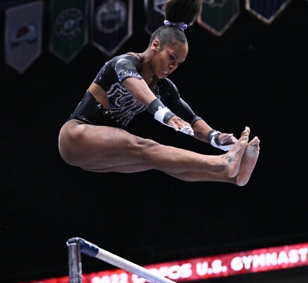 Shilese Jones competes on bars