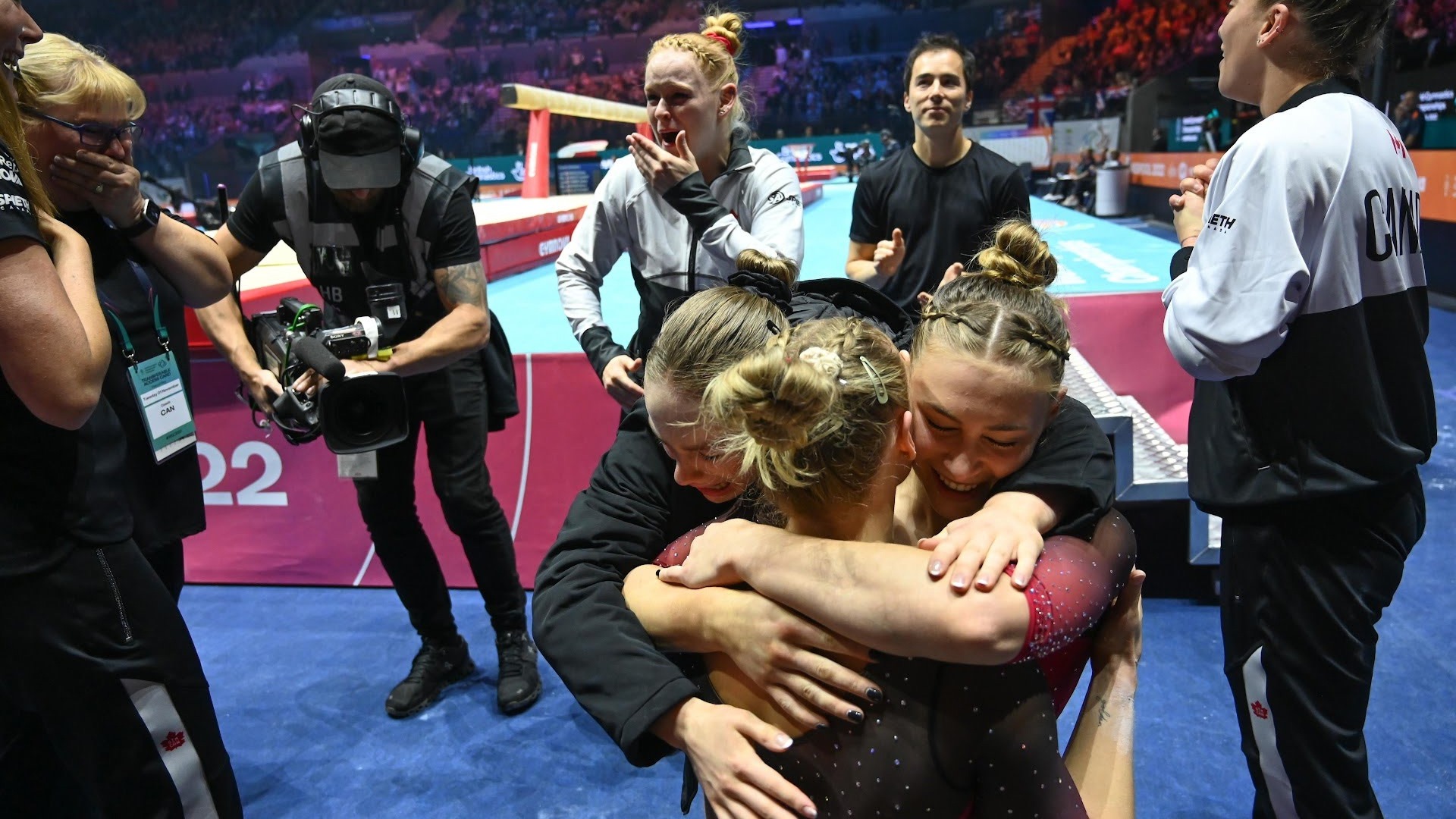 The Canada women's team celebrates after winning bronze during the team final at the 2022 World Gymnastics Championships.