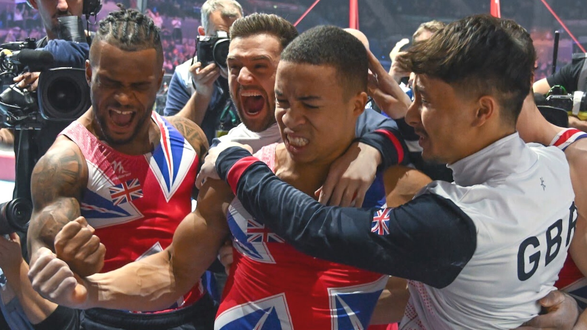 The men of Team Great Britain react after winning bronze in the men's team final at the 2022 World Gymnastics Championships.