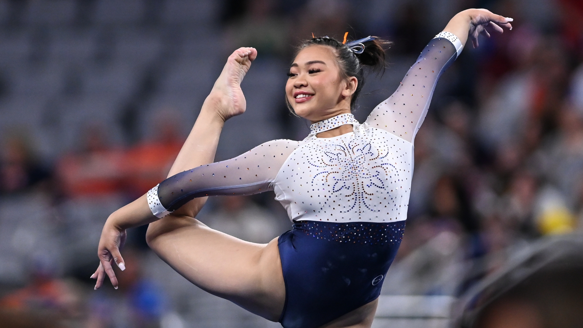 Auburn's Sunisa Lee dances on floor during the semifinals of the 2022 NCAA Women's Gymnastics Championships.