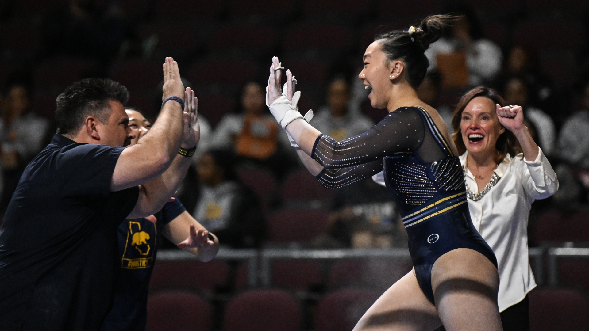 Members of the Cal Golden Bears' gymnastics team celebrate during the 2023 Super 16 meet in Las Vegas.