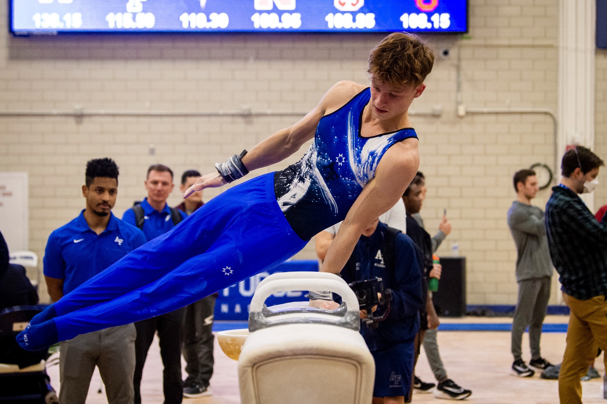 Air Force's Patrick Hoopes swings pommel horse during the Falcons' meet against Army and California.
