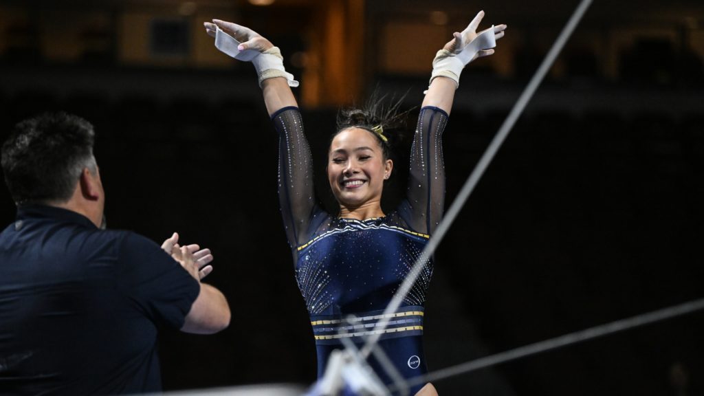Cal's Maddie Williams salutes after her uneven bars routine during the 2023 Super 16 meet.