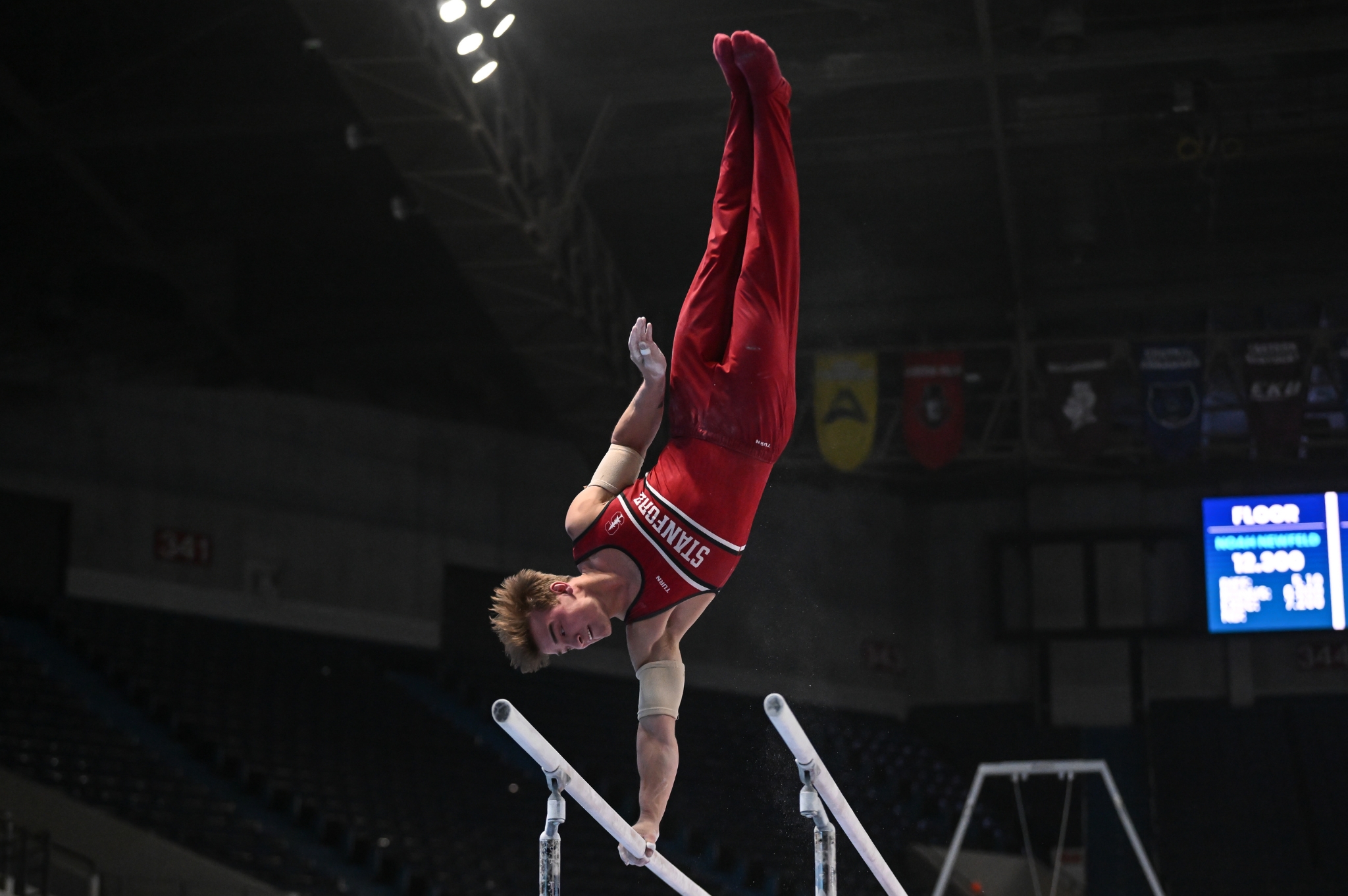 Stanford's Curran Phillips in his element on parallel bars during Day 2 of men's competition at the 2023 Winter cup on Feb. 26 in Louisville, Kentucky.