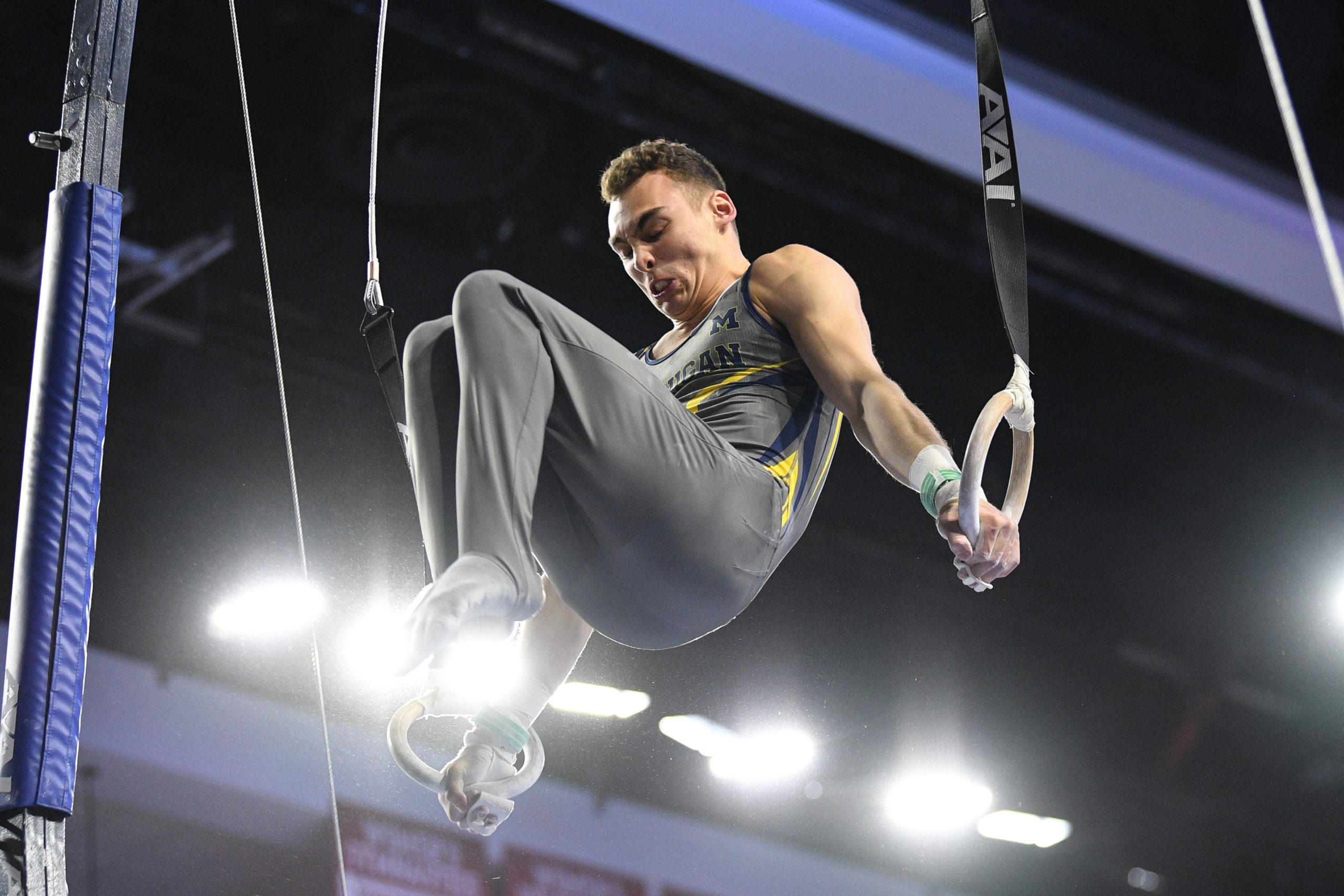 Michigan's Crew Bold competes on still rings during the 2022 NCAA Men's Gymnastics Championships.