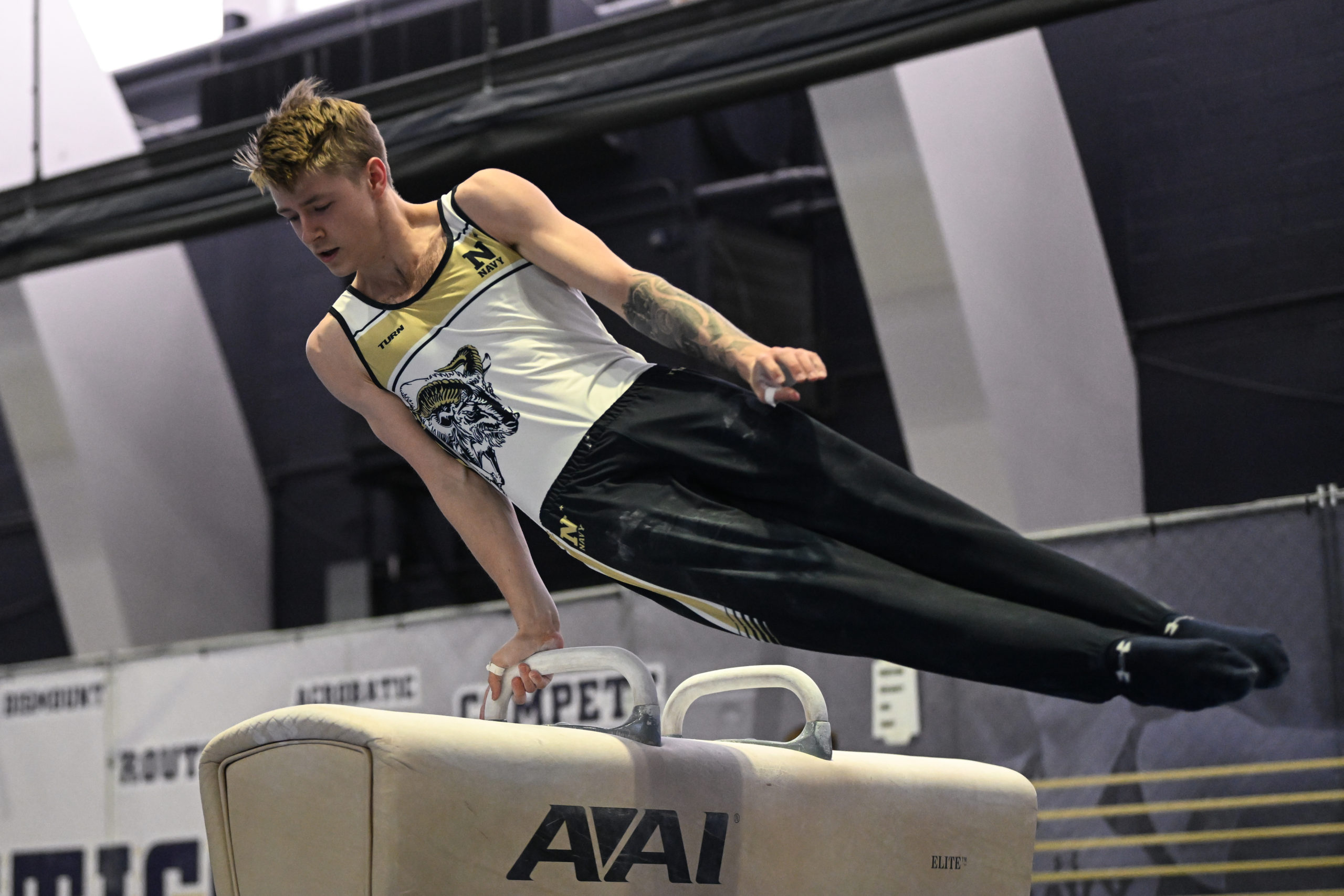 Navy's Ronan McQuillan competes on pommel horse during a home meet against Stanford and Air Force on March 11, 2023.