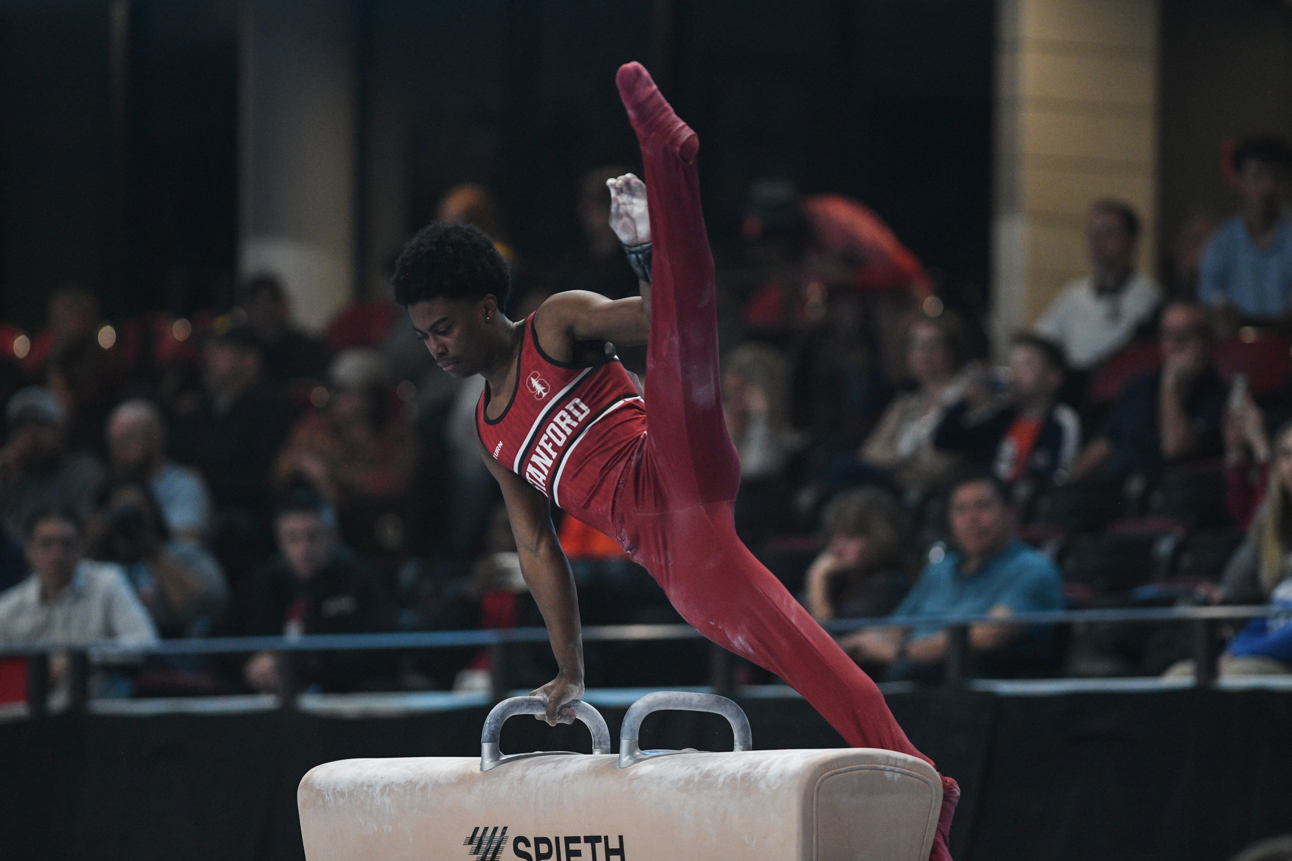 Stanford's Khoi Young performs a scissor element on pommel horse during Day 2 of the 2023 Winter Cup.