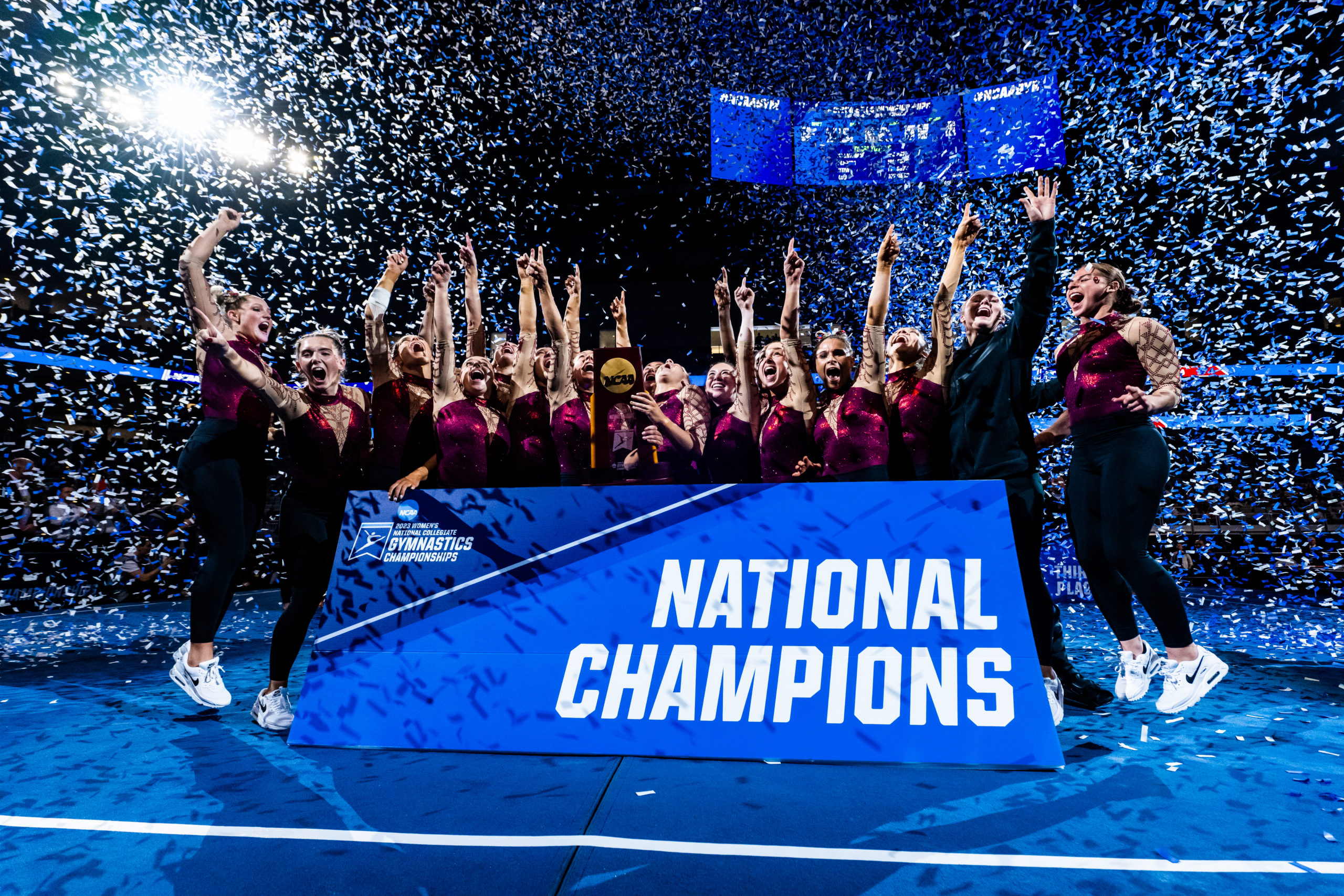 The Oklahoma Sooners celebrate after winning the 2023 NCAA Women's Gymnastics Championships team title.