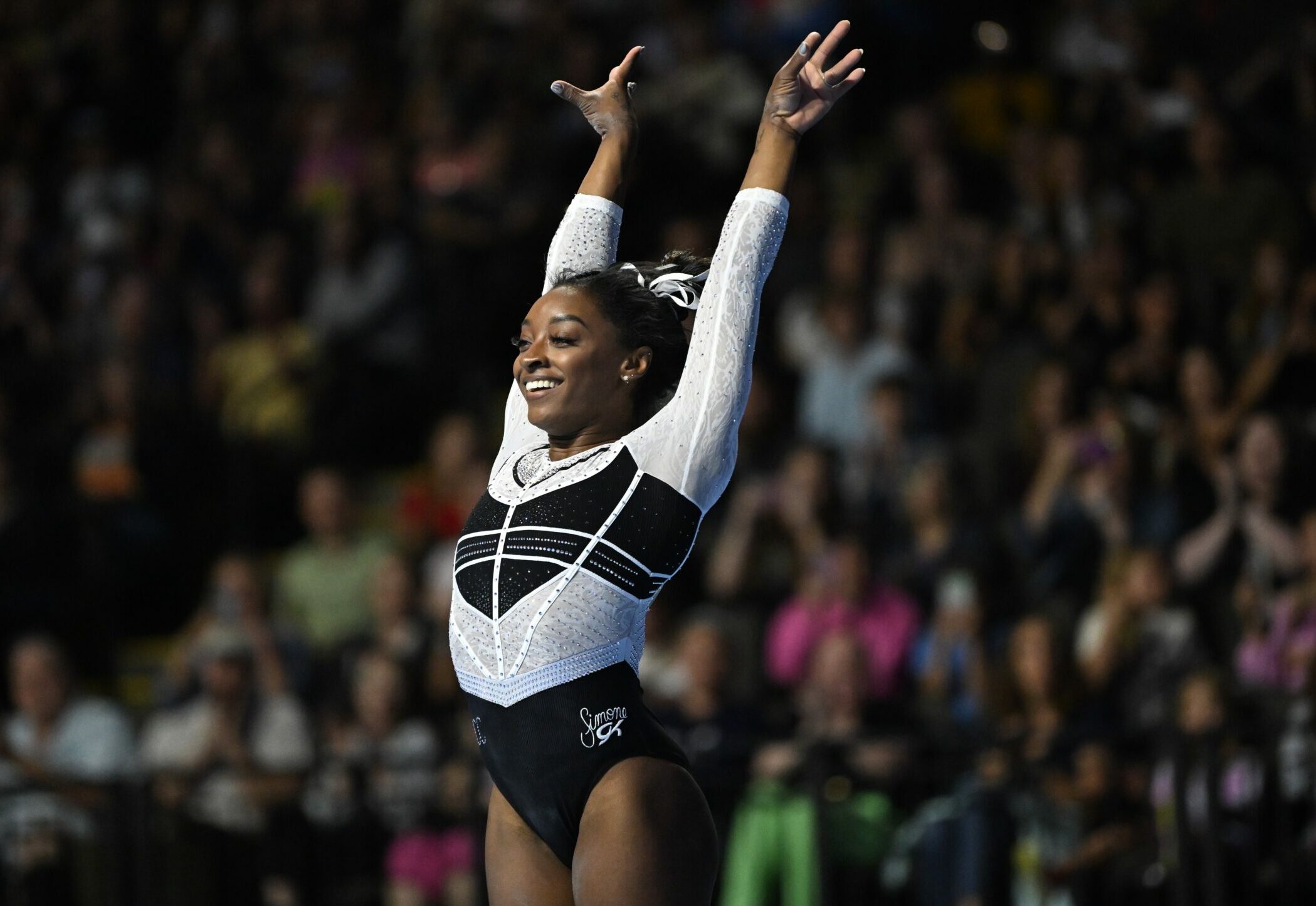 Simone Biles salutes during the 2023 Core Hydration Classic.