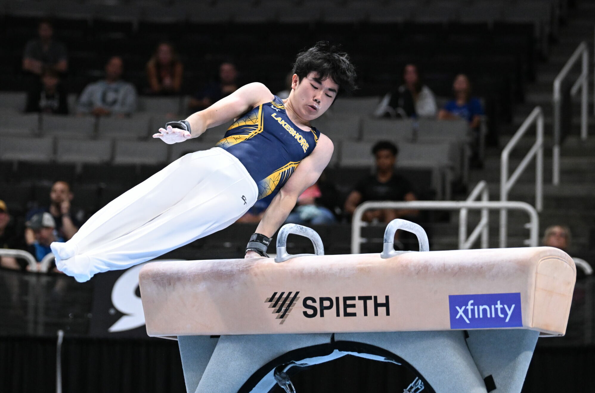 Kai Uemura swings pommel horse during Day 2 of junior men's competition at the 2023 Xfinity U.S. Gymnastics Championships.