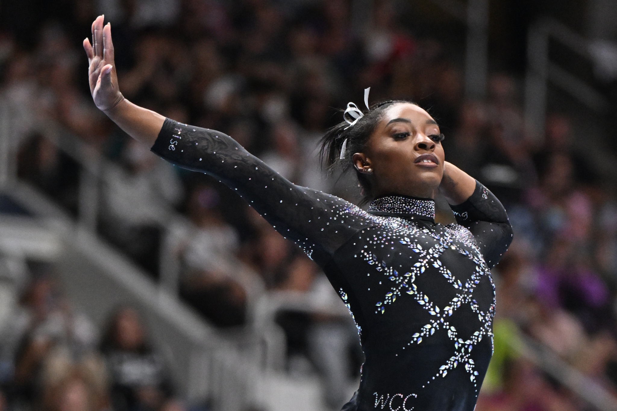 Simone Biles competes on beam during Day 2 of senior women's competition at the 2023 Xfinity U.S. Gymnastics Championships.