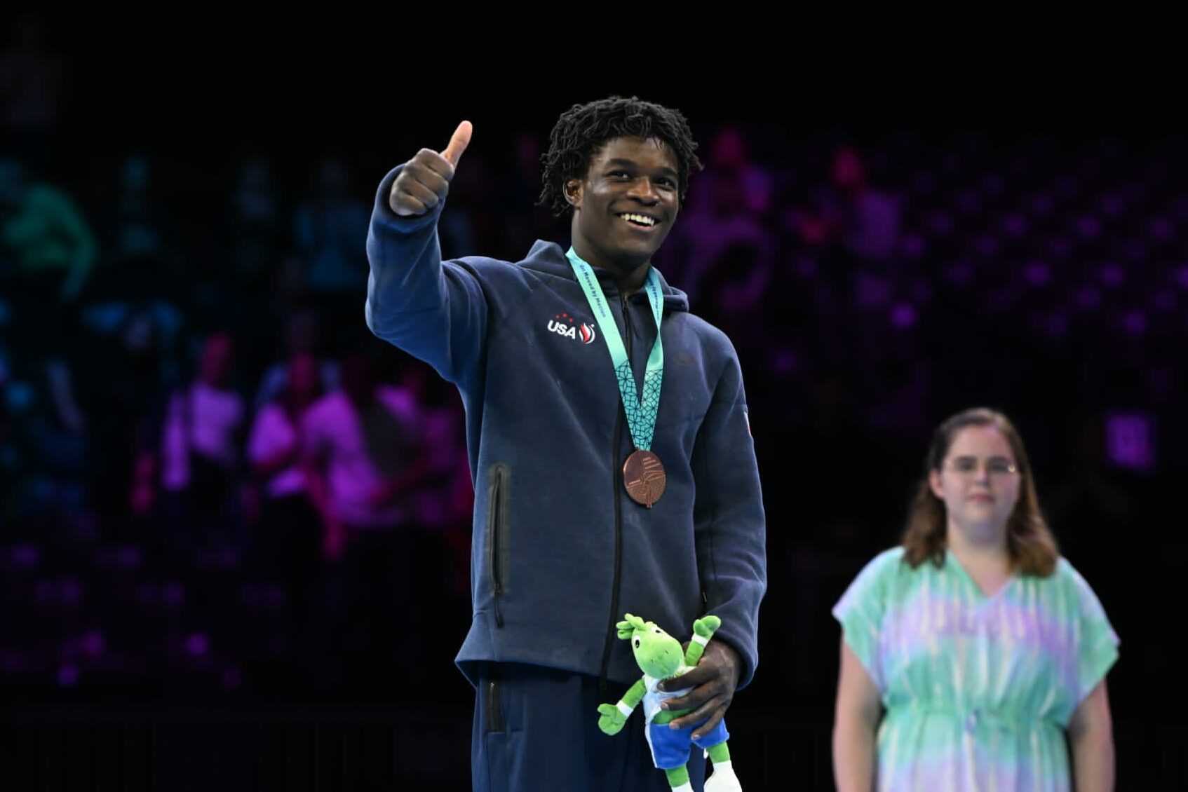 Fred Richard (USA) on the men's all-around podium at the 2023 World Artistic Gymnastics Championships.