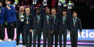 The U.S. men's team on the men's team final podium at the 2023 World Artistic Gymnastics Championships.