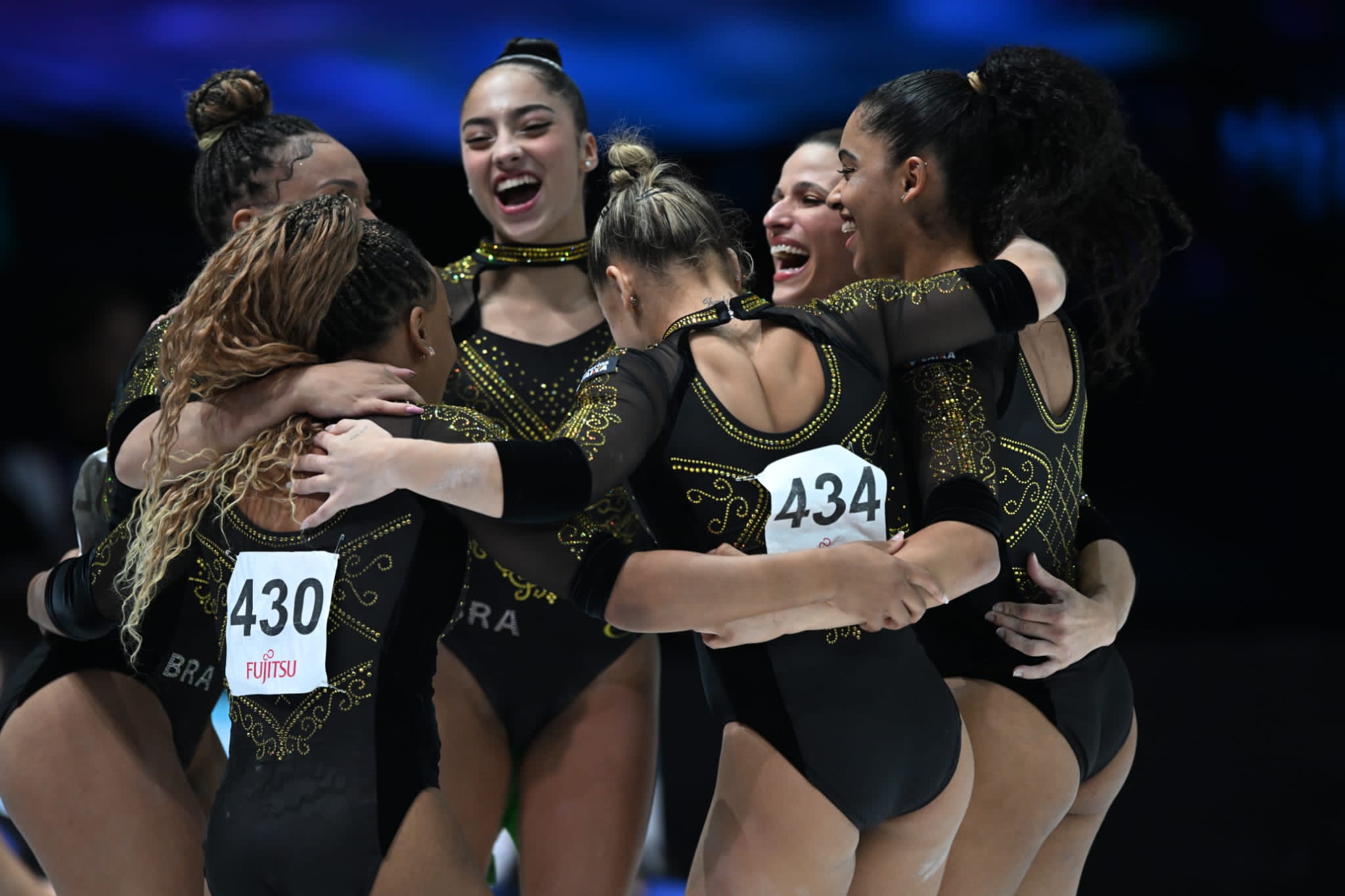 The Brazil women's team celebrates after winning silver during the 2023 World Artistic Gymnastics Championships.