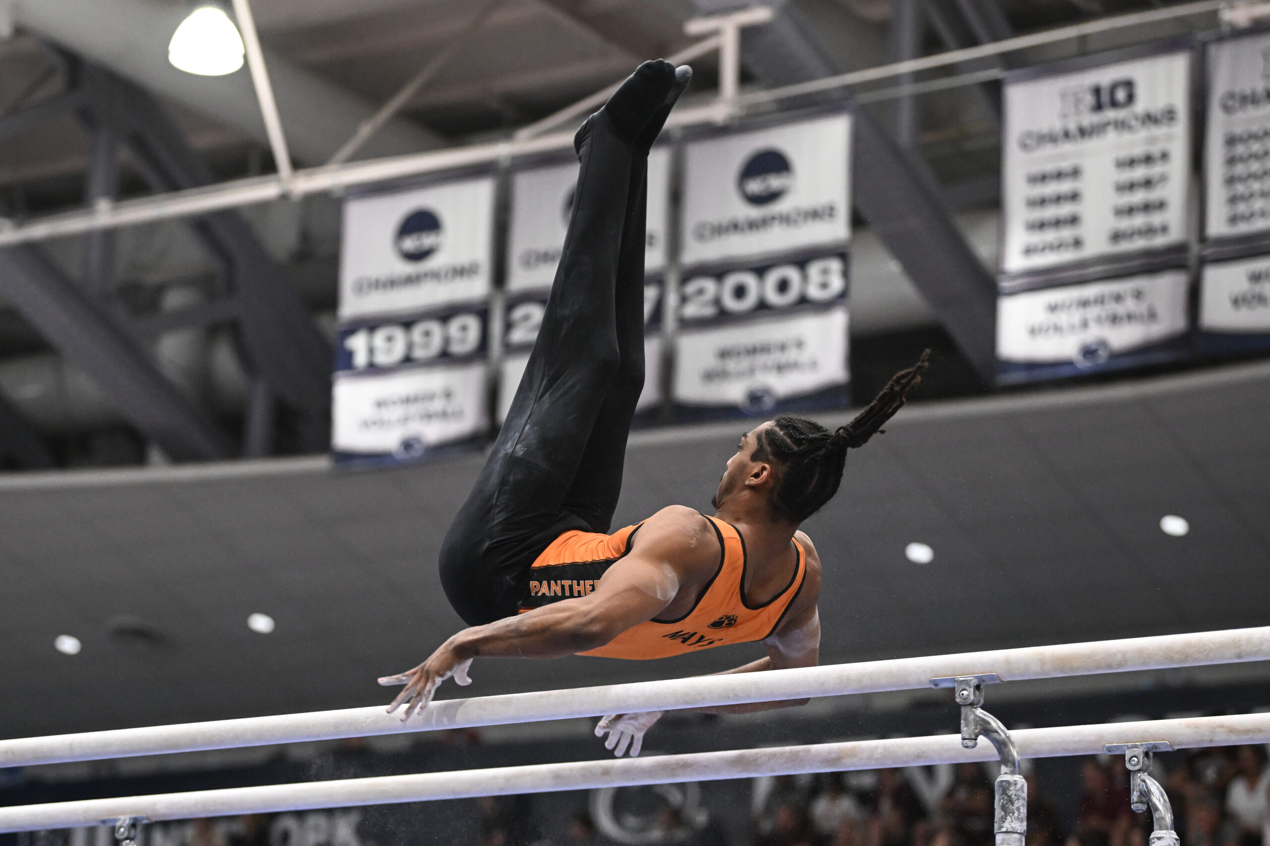 Greenville's Ricky Mays on parallel bars at the 2023 NCAA Men's Gymnastics Championships.