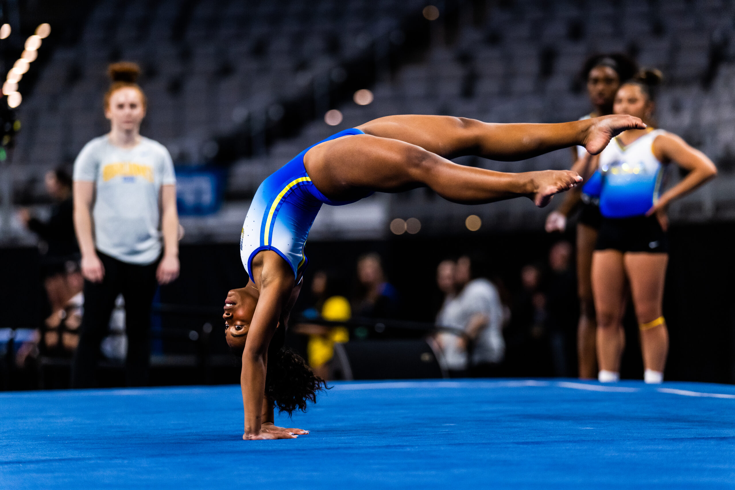 UCLA's Selena Harris on floor during podium training at the 2023 NCAA Women's Gymnastics Championships.