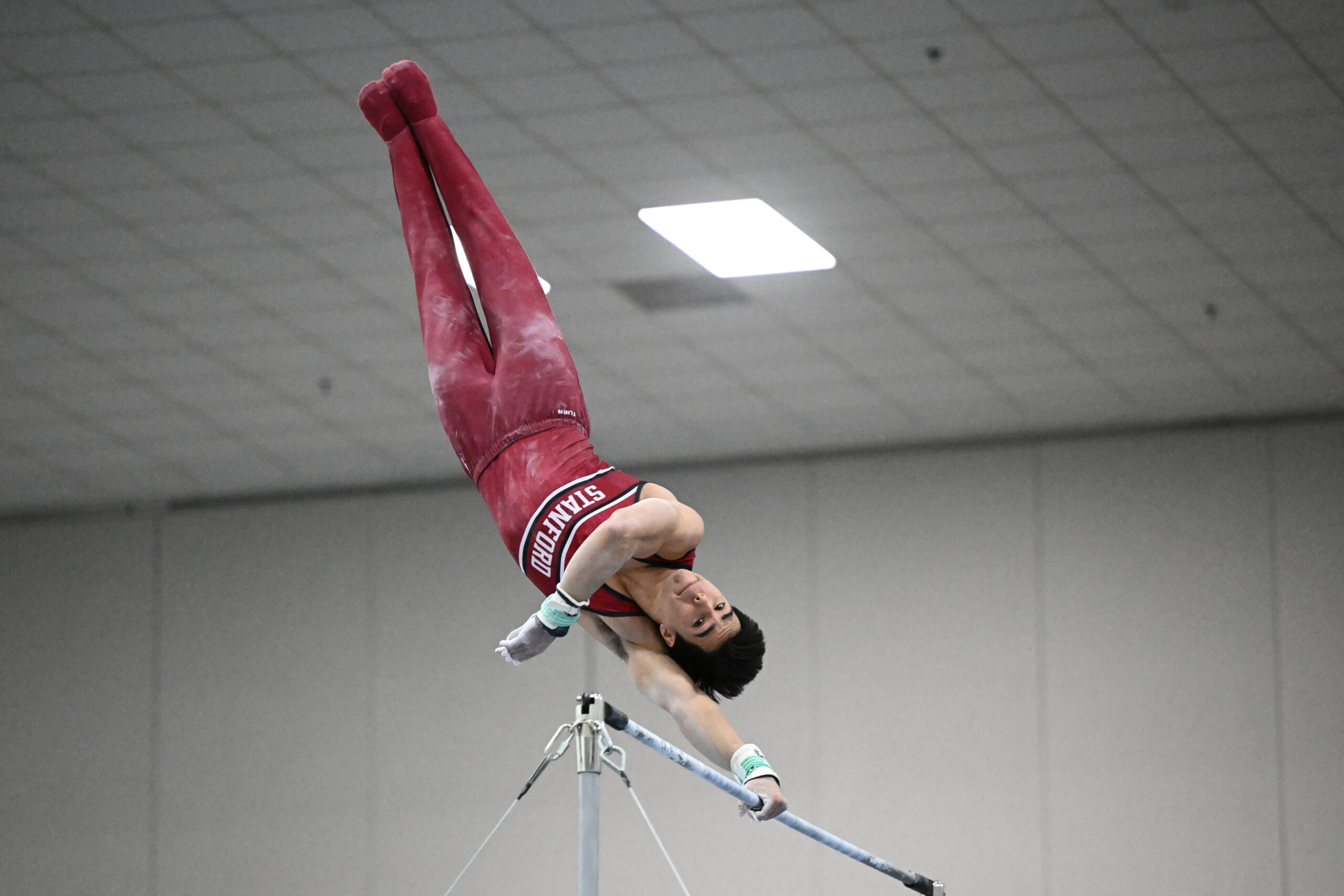 Stanford's Jeremy Bischoff on high bar at the 2024 Winter Cup.