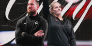 Ryan Roberts (left) and Cecile Canqueteau-Landi (right) will lead the Georgia GymDogs as co-head coaches.