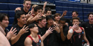 The Stanford men's gymnastics team celebrates its fourth straight title at the 2023 NCAA Men's Gymnastics Championships.