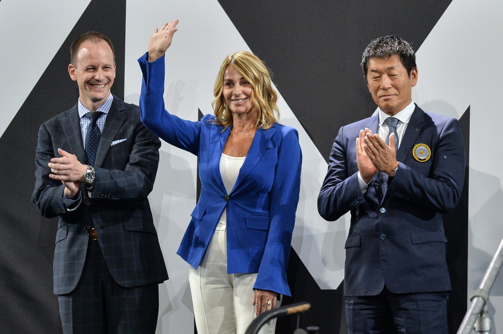 Nadia Comăneci waves