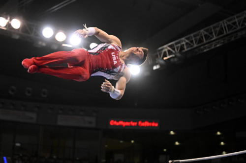 Brody Malone (Stanford) competes on high bar during event finals at the 2023 DTB Pokal. (© Filippo Tomasi)