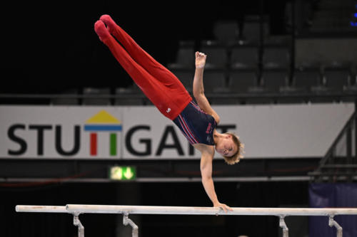 Danila Leykin (EVO) competes on parallel bars during event finals at the 2023 DTB Pokal. (© Filippo Tomasi)